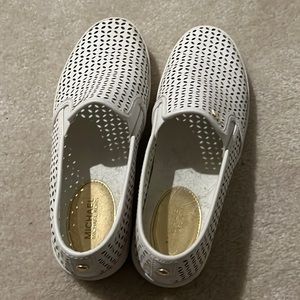Michael Kors slip on sneakers.